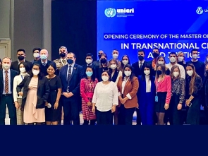 LL.M. students, Faculty, and participants at the Opening Ceremony, pose in group photo. 